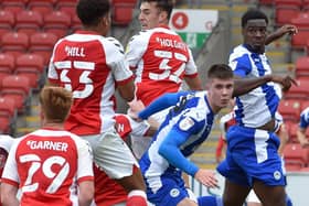 Adam Long and Emeka Obi in action at Fleetwood