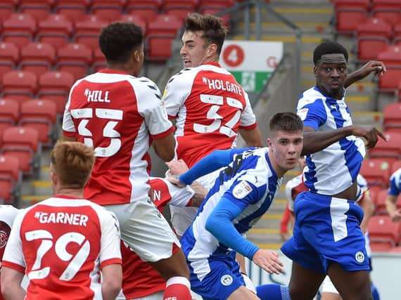 Adam Long and Emeka Obi in action at Fleetwood