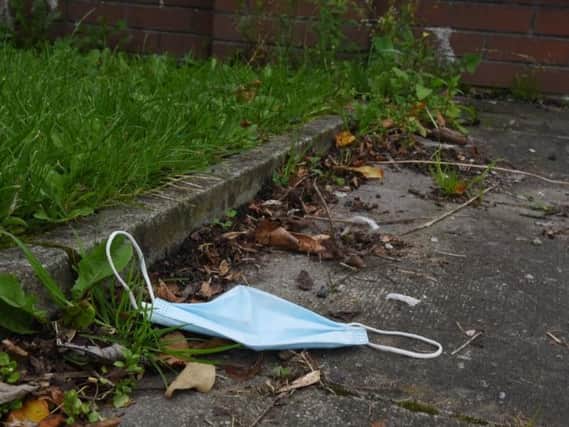 A discarded face mask in Wigan