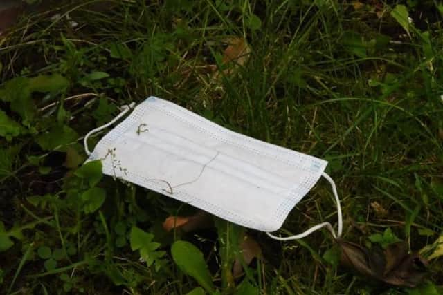 Face masks litter the streets of Wigan