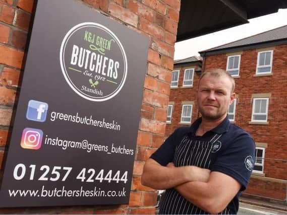 David Green from K and J Green Butchers getting ready to open his new shop on Moores Lane, Standish