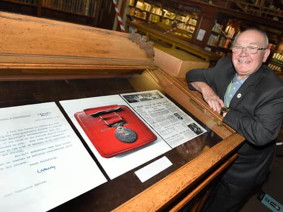 Coun George Davies with the exhibition
