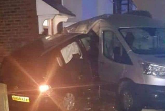 The Zafira embedded in the side of a van