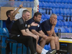 The Latics bench at Ipswich