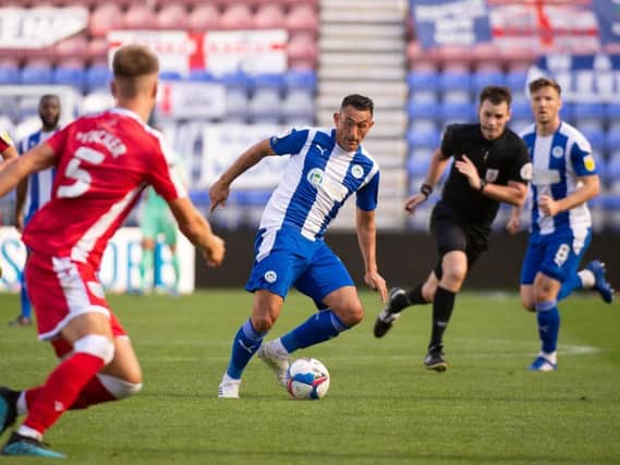 Gary Roberts in action before he limped off