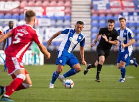 Gary Roberts in action before he limped off