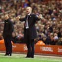 Brendan Rodgers, manager of Liverpool and Manager Sean Dyche of Burnley on the touchline during the Barclays Premier League match between Liverpool and Burnley at Anfield on March 4, 2015 in Liverpool, England. (Photo by Michael Steele/Getty Images)