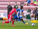 Viv Solomon-Otabor gives the Gillingham defence a tough time