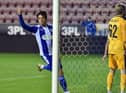 Charlie Jolley celebrates finding the net