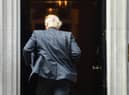 Prime Minister Boris Johnson arrives in Downing Street after giving an update on Coronavirus lockdown measures