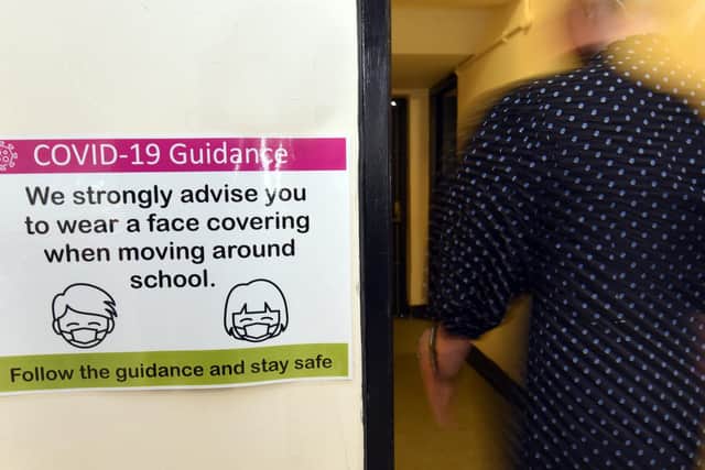A notice in a Wigan school outlining Covid-19 guidance