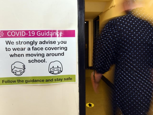 A notice in a Wigan school outlining Covid-19 guidance