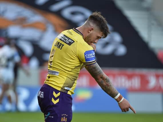 Oliver Gildart celebrates his try against Hull FC