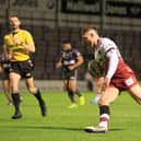 Jackson Hastings goes over for Wigan's first try