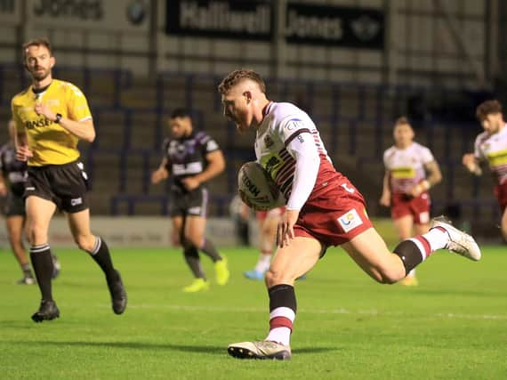 Jackson Hastings goes over for Wigan's first try