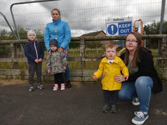 Agnieszka Kuzma with Julia, five, and Agata, three, with Emma Vaughan and son Toby, one