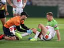 Ryan Sutton receives treatment