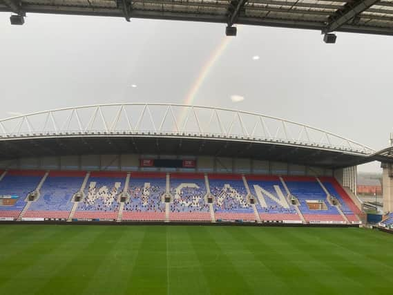 A rainbow sums up the mood at Wigan Athletic on Wednesday evening