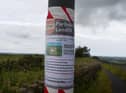 A sign objecting to the landfill scheme on Parbold Hill