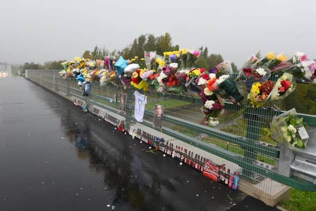 Flowers, balloons and other items left at a makeshift shrine for Samson