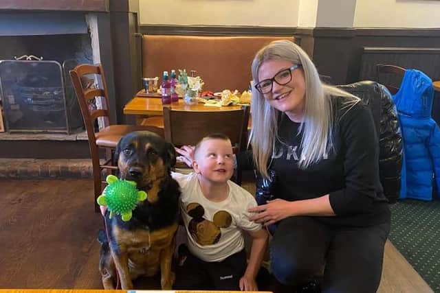 Emma Doherty and Bobby Baldwin meet Minnie the dog at the Foresters Arms