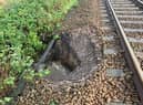 Heavy rain caused part of the embankment supporting the Wigan to Southport line to give way