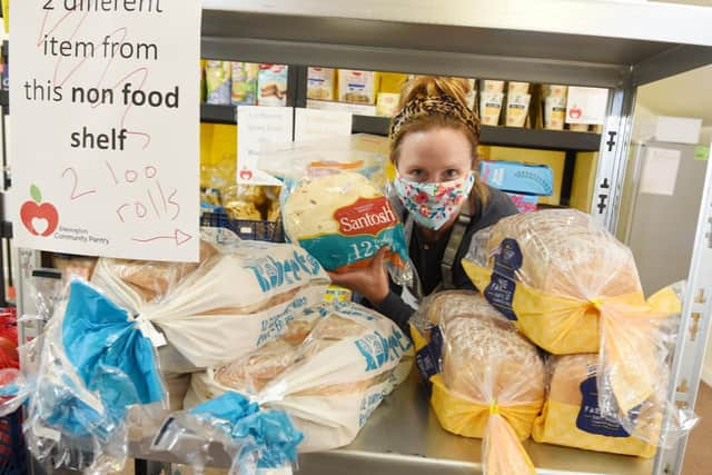 Vicky Little with some of the low-cost food members can pick up