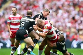Lee Mossop takes the ball up for Wigan during the 2013 Challenge Cup final