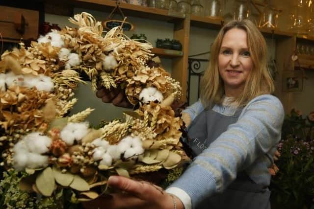 Kerry Docherty with an autumn wreath