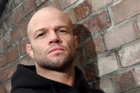 Mike Grundy outside his Wigan gym, Elite Fitness Factory