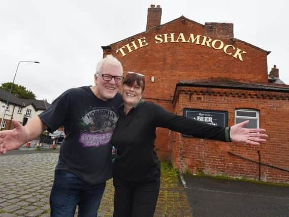 Jim and Fiona Harrison outside their new pub when it opened