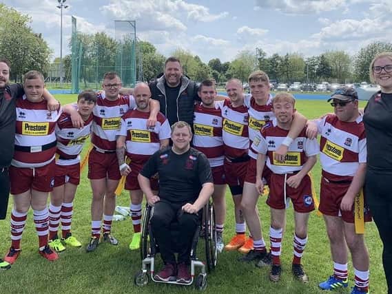 Scott Burns (centre, back row) with some of the Wigan Warriors’ Physical and Learning Disability teams