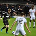 Matty Palmer in action against MK Dons