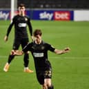 Chris Merrie in action at MK Dons