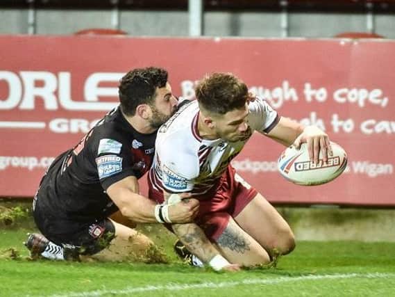 Oliver Gildart in try-scoring action for Wigan Warriors