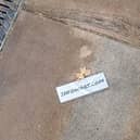 One of the many stickers found in Wigan town centre