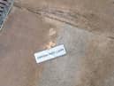 One of the many stickers found in Wigan town centre