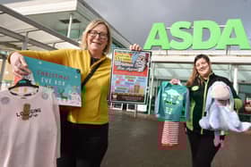 Maureen Holcroft, from Daffodils Dreams, launches the Christmas Eve box campaign with Charlene Frodsham, community champion at Asda in Newtown