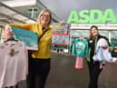 Maureen Holcroft, from Daffodils Dreams, launches the Christmas Eve box campaign with Charlene Frodsham, community champion at Asda in Newtown