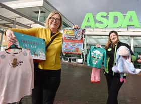 Maureen Holcroft, from Daffodils Dreams, launches the Christmas Eve box campaign with Charlene Frodsham, community champion at Asda in Newtown