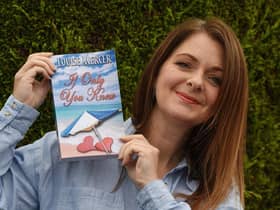 Louise Mercer with her novel