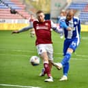 Joe Garner shoots for goal against Northampton