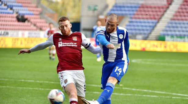 Joe Garner shoots for goal against Northampton