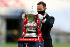 The FA Cup, won by Wigan Athletic in 2013