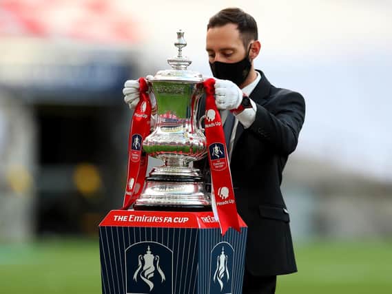 The FA Cup, won by Wigan Athletic in 2013