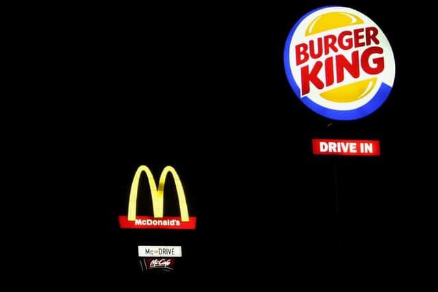 Burger King is encouraging the public to order takeaways from rival fast food chain McDonald’s