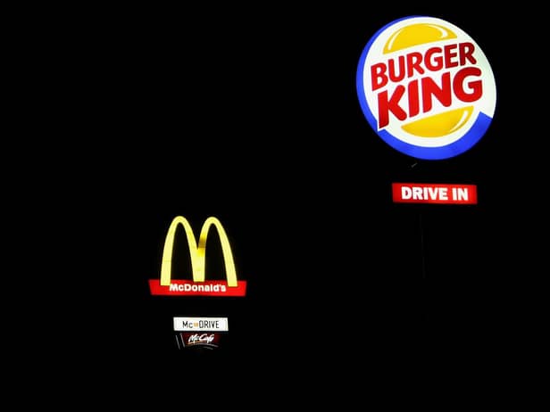 Burger King is encouraging the public to order takeaways from rival fast food chain McDonald’s
