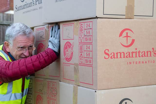 Some of the boxes being packed onto the lorry