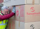 Some of the boxes being packed onto the lorry
