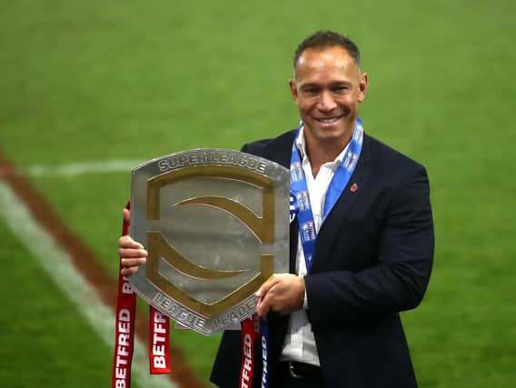 Adrian Lam gets his hand on the league leaders shield